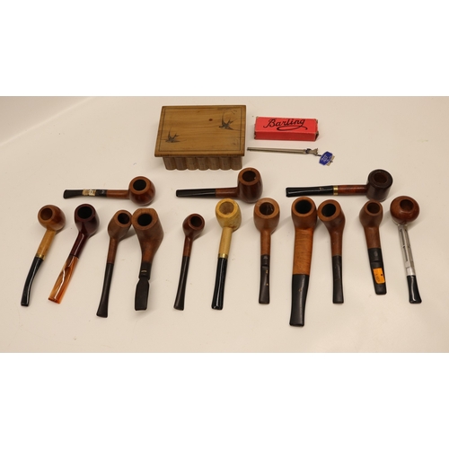 Collection of tobacco pipes with accessories comprising Dr McQuade ...