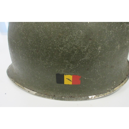 220 - British Mk5 steel helmet (The Turtle) issued from 1959, complete with original liner and elastic chi... 