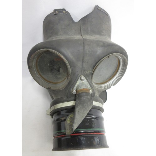 123 - Three WW2 gas masks (one civilian, one military issue, one A.R.P AF) dated 1940/1941/1942, one in or... 