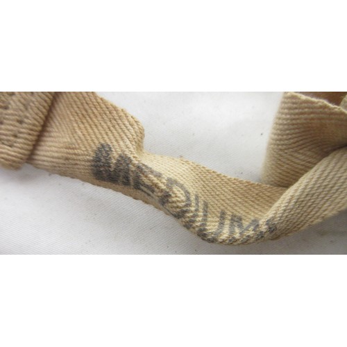 123 - Three WW2 gas masks (one civilian, one military issue, one A.R.P AF) dated 1940/1941/1942, one in or... 