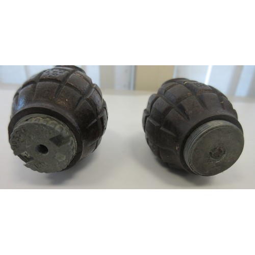 155 - Two inert WW1 British Mk1 Mills hand grenades, one with no.36 base plug (both inert, in very good co... 