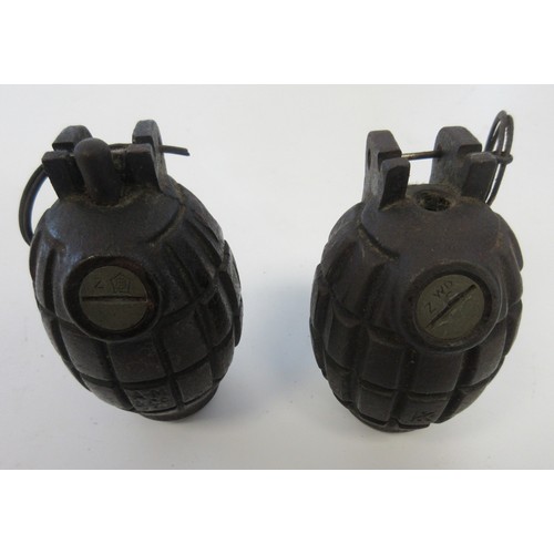 155 - Two inert WW1 British Mk1 Mills hand grenades, one with no.36 base plug (both inert, in very good co... 