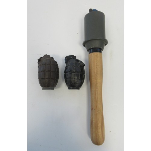 156 - Three inert hand grenades, two British Mills hand grenade one with No.51 base plug and one German st... 