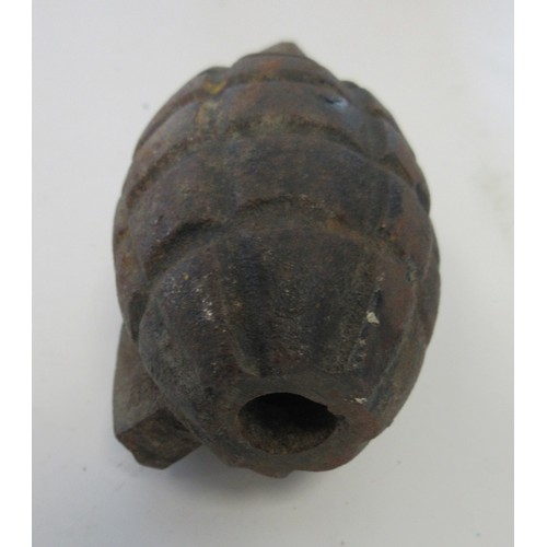 157 - One inert British Mills hand grenade (no base plug present) and one inert German stick grenade (2)

... 