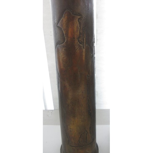121 - Three decorative brass trench art vases, one with 'Libre' and soldier detailing, one '1918 Damascus'... 