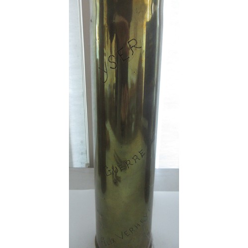 121 - Three decorative brass trench art vases, one with 'Libre' and soldier detailing, one '1918 Damascus'... 