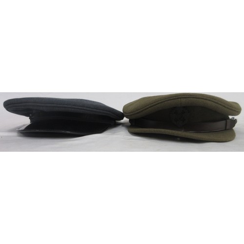 125 - Two British military caps incl. one Army officers cap with R.E.M.E cap badge made by Thomas & Stone ... 