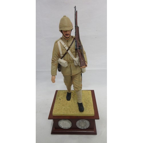 173 - Danbury Mint- Three military Danbury Mint commemorative coin display figures to incl. 'The Defence a... 