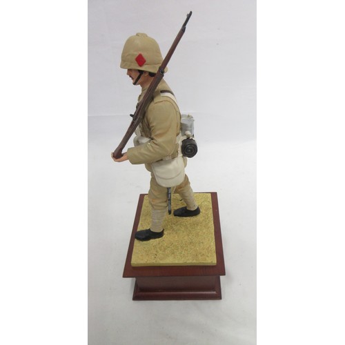 173 - Danbury Mint- Three military Danbury Mint commemorative coin display figures to incl. 'The Defence a... 