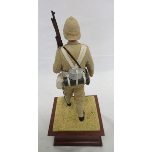 173 - Danbury Mint- Three military Danbury Mint commemorative coin display figures to incl. 'The Defence a... 