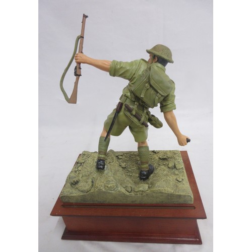 173 - Danbury Mint- Three military Danbury Mint commemorative coin display figures to incl. 'The Defence a... 