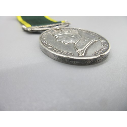 54 - Territorial Efficiency Medal (George VI) 'For Efficient Service' To. 773125 Gnr. G. Paterson. R.A.

... 