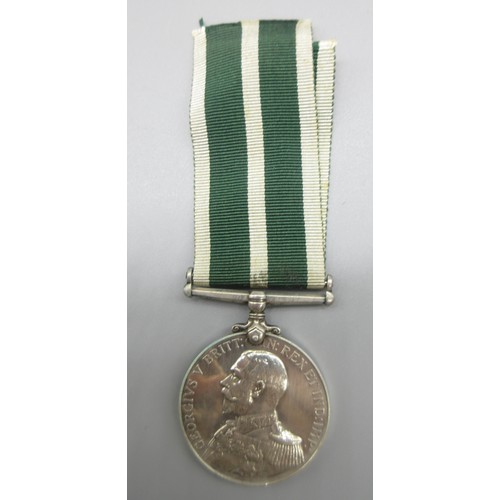 57 - Royal Naval Reserve Long Service and Good conduct medal (George V) with 2nd type ribbon and the mott... 