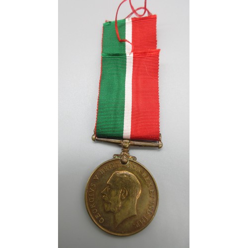 57 - Royal Naval Reserve Long Service and Good conduct medal (George V) with 2nd type ribbon and the mott... 