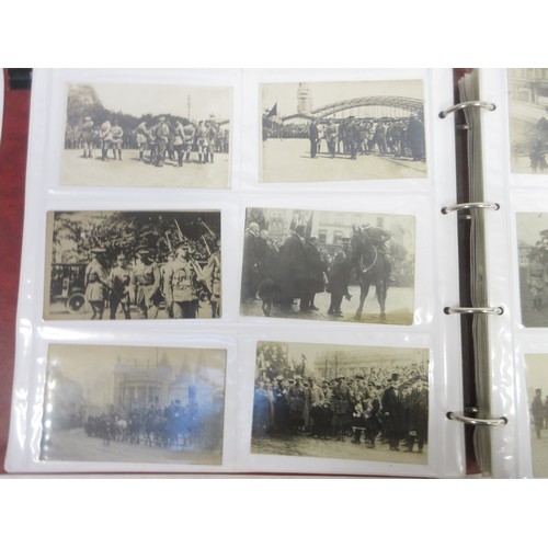 171 - Two WW1 postcard albums to incl. personal letters, POW cards/photos, parades/inspections, Daily Mail... 
