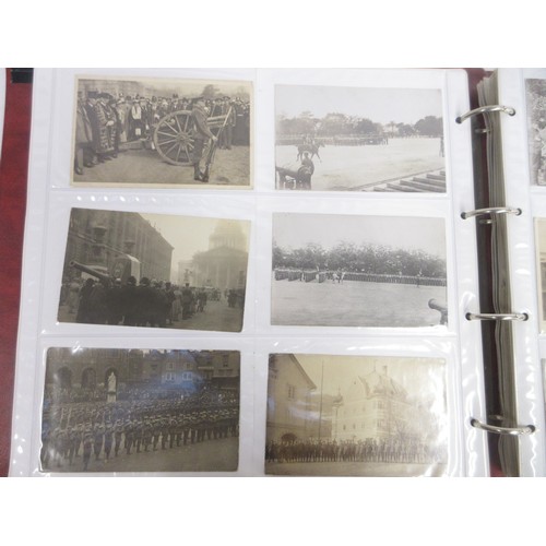 171 - Two WW1 postcard albums to incl. personal letters, POW cards/photos, parades/inspections, Daily Mail... 