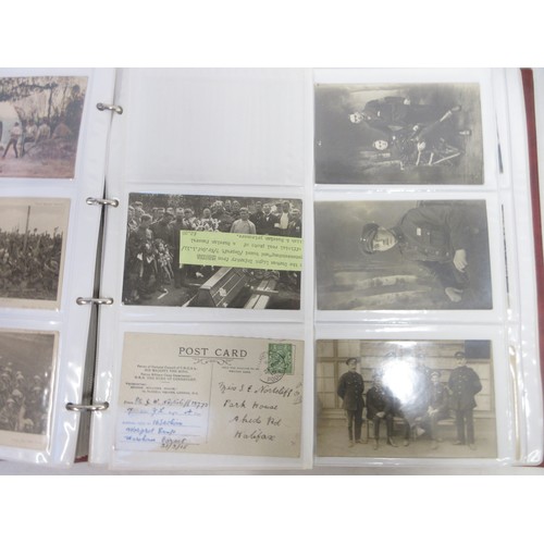 171 - Two WW1 postcard albums to incl. personal letters, POW cards/photos, parades/inspections, Daily Mail... 
