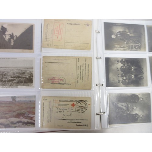 171 - Two WW1 postcard albums to incl. personal letters, POW cards/photos, parades/inspections, Daily Mail... 