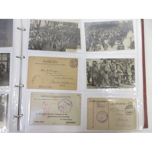 171 - Two WW1 postcard albums to incl. personal letters, POW cards/photos, parades/inspections, Daily Mail... 