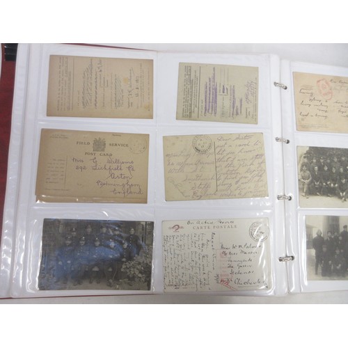 171 - Two WW1 postcard albums to incl. personal letters, POW cards/photos, parades/inspections, Daily Mail... 
