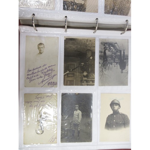 171 - Two WW1 postcard albums to incl. personal letters, POW cards/photos, parades/inspections, Daily Mail... 