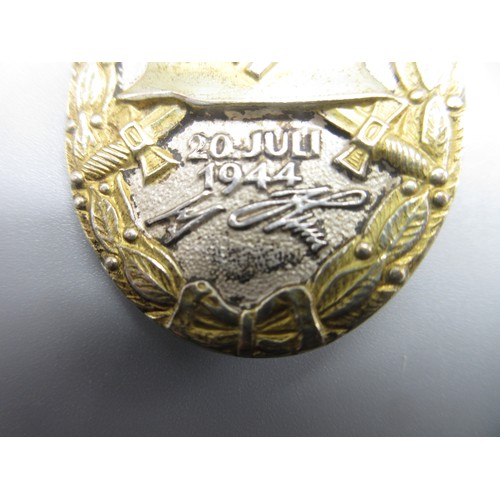 129 - German wound badge '20 July 1944' with signatures L/12 mark on back, in case

Bradleys shipping £28.... 