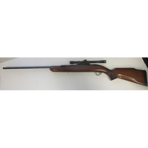 434 - BSA top loading under lever .22 Air rifle, with BSA 4X20 scope, serial number GN60222

Bradleys ship... 
