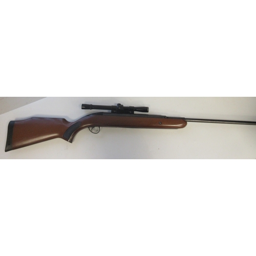 434 - BSA top loading under lever .22 Air rifle, with BSA 4X20 scope, serial number GN60222

Bradleys ship... 
