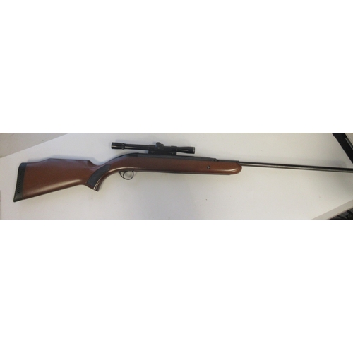 434 - BSA top loading under lever .22 Air rifle, with BSA 4X20 scope, serial number GN60222

Bradleys ship... 