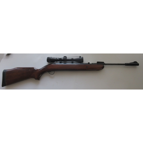 443 - BSA Airsporter, .22 air rifle, under lever action with top loader, 4X32 scope

Bradleys shipping POA... 