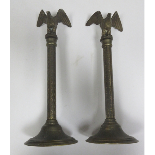132 - Pair of ornate  garniture pieces, flying eagles on columns with leave decoration, plane circular bas... 