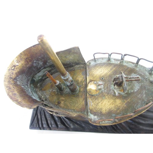 166 - German U-Boat conning tower brass trench-art style ornament on wooden base

Bradleys shipping £38.00... 