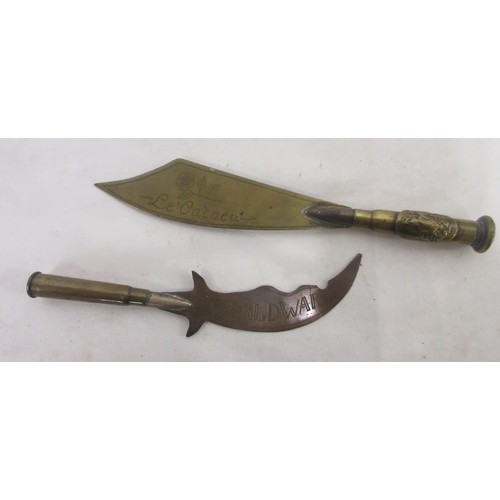 167 - Mixed collection of militaria to incl. brass trench art incl. two engraved kukris, cigarette holder,... 