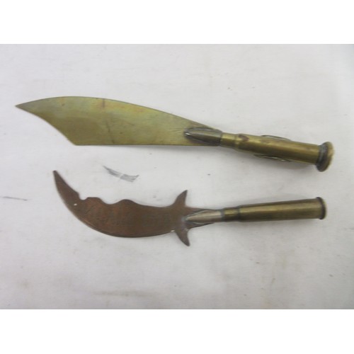 167 - Mixed collection of militaria to incl. brass trench art incl. two engraved kukris, cigarette holder,... 