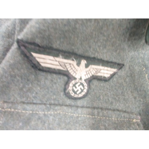 169 - German Army field blouse/tunic with cuff title and wound badge and leather belt

Bradleys shipping £... 