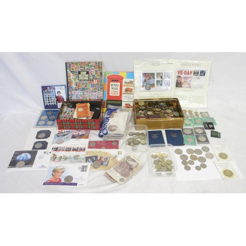 Large collection of International coins, banknotes and stamps to inc ...