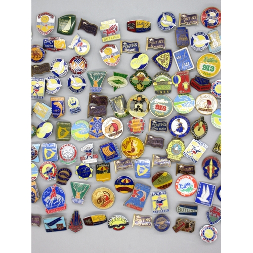 Collection of Butlins, Pontins and other pin badges, covering various ...