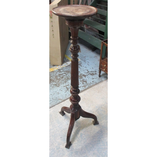 638 - Geo.111 style mahogany torchere, turned and fluted column on three downcurved supports, H107cm

Brad... 