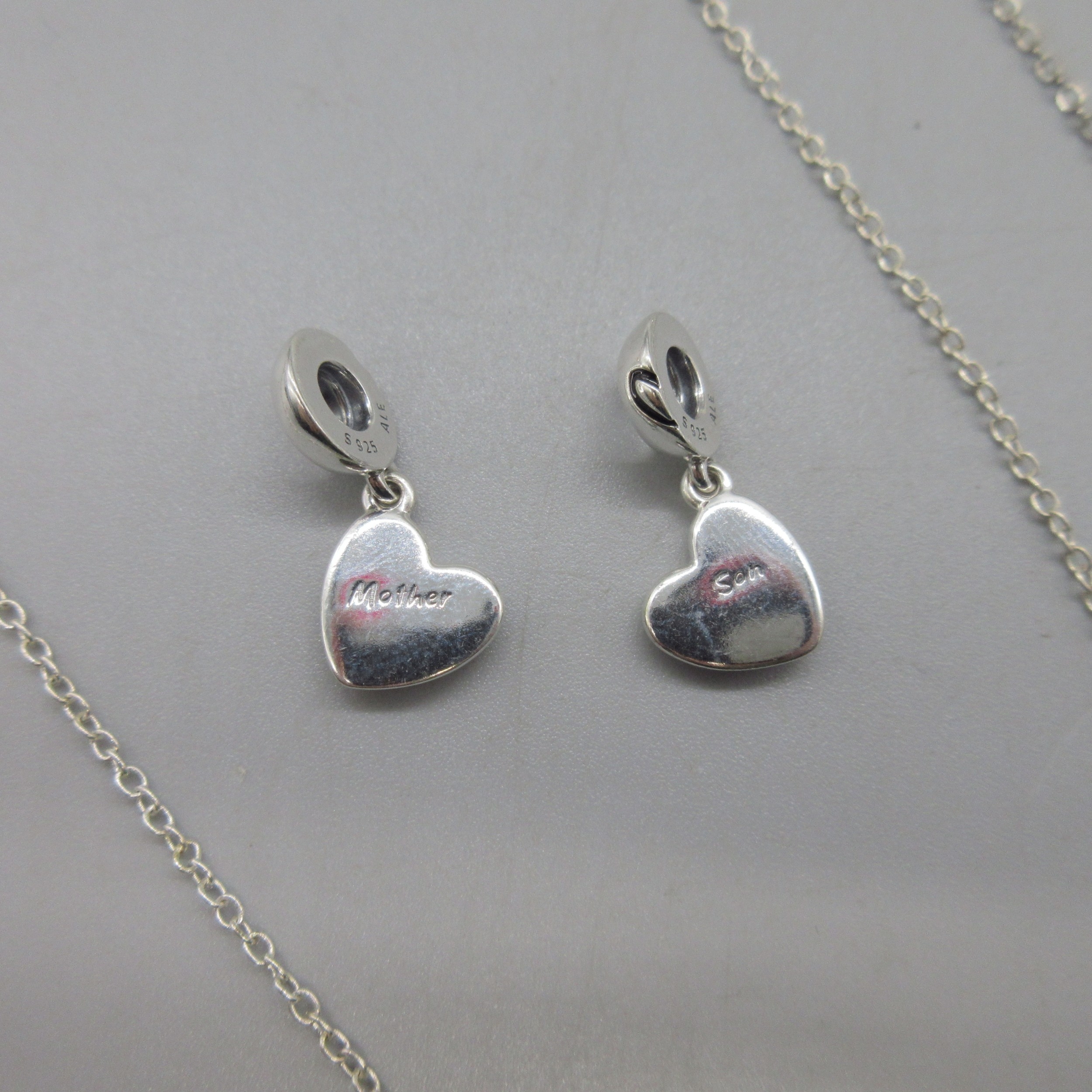 Collection of silver pandora jewellery to include a ring set with clear ...
