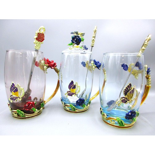 792 - Floral & butterfly-encrusted glassware comprising blooming teapot with cover, 32cl coffee mug & thre... 