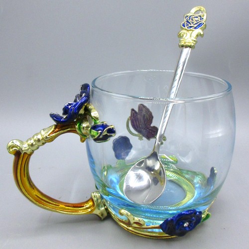 792 - Floral & butterfly-encrusted glassware comprising blooming teapot with cover, 32cl coffee mug & thre... 