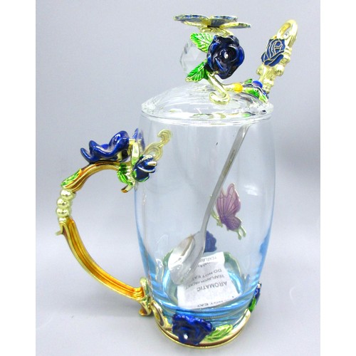 792 - Floral & butterfly-encrusted glassware comprising blooming teapot with cover, 32cl coffee mug & thre... 