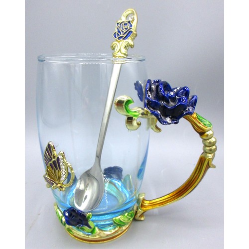 792 - Floral & butterfly-encrusted glassware comprising blooming teapot with cover, 32cl coffee mug & thre... 