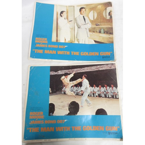 435 - James Bond memorabilia to incl. signed Roger Moore 'My Word is my Bond' book, large Moonraker film p... 