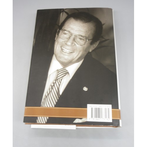 435 - James Bond memorabilia to incl. signed Roger Moore 'My Word is my Bond' book, large Moonraker film p... 