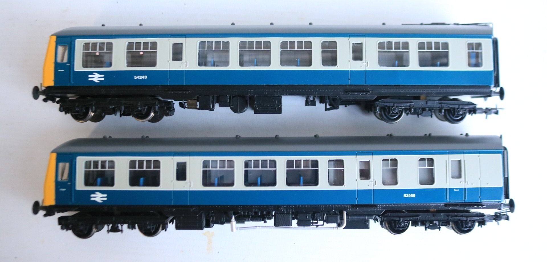 Two OO gauge two car DMU train packs with power and dummy cars from ...