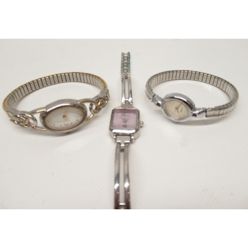 270 - Three Eiger chrome quartz wristwatches, D41.3mm; ladies quartz wristwatches Timex, Yves Rocher, Solo... 