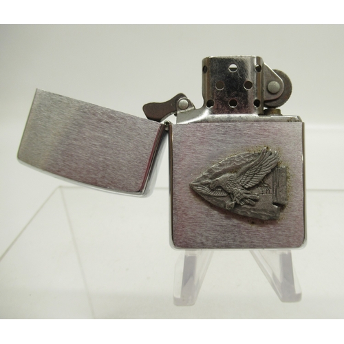 312 - Zippo 'Statue of Liberty' lighter and eight other Zippo lighters

Bradley's shipping £33.00 plus vat... 