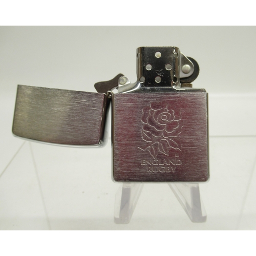 312 - Zippo 'Statue of Liberty' lighter and eight other Zippo lighters

Bradley's shipping £33.00 plus vat... 