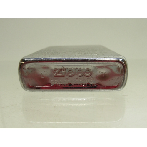 312 - Zippo 'Statue of Liberty' lighter and eight other Zippo lighters

Bradley's shipping £33.00 plus vat... 